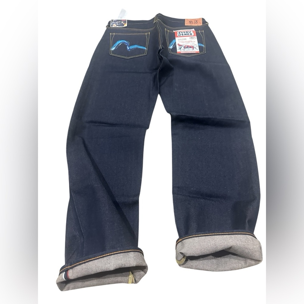 Vtg heritage Evisu seldvage denim with blue Evisu logo on the pockets